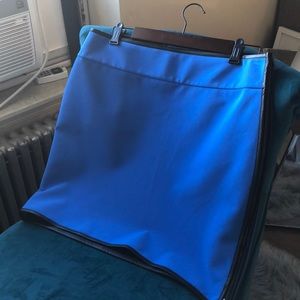 Bright blue scuba skirt with leather trim